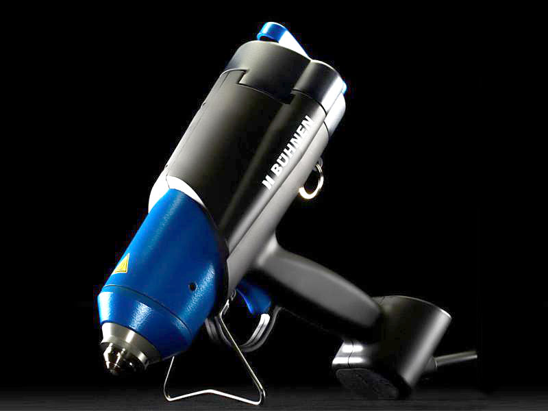 The Buhnen HB 710 SPRAY applicator has been in the product offering since 2005 and is proven as a reliable, versatile hot melt adhesive applicator.  It offers balanced ergonomics, complete digital temperature control and is a versatile hand held applicator for manual applications in industrial environments.  Hot melt adhesives in the form of granules, pillows or 42 mm cartridges can be utilized in the melt tank making this a very versatile applicator.  Pneumatic assisted for easy of use.